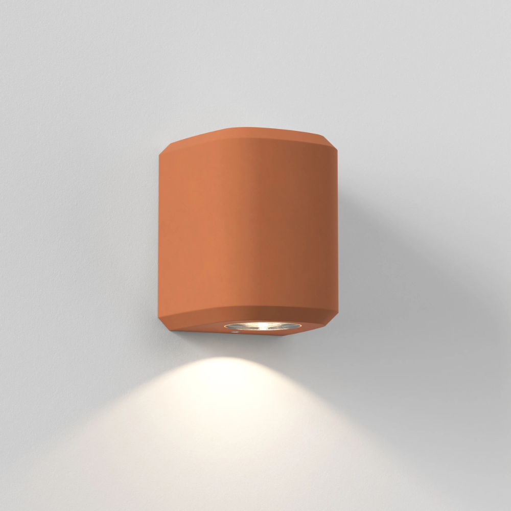 The Brixham Wall Single outdoor sconce in terracotta concrete by Astro Lighting.