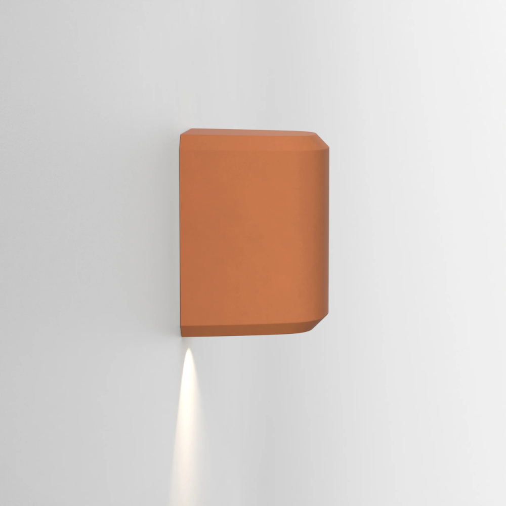 The Brixham Wall Single outdoor sconce in terracotta concrete by Astro Lighting profile view.