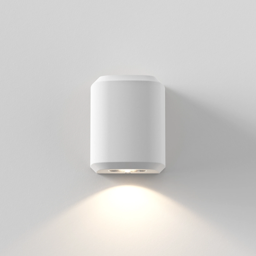 The Brixham Wall Single outdoor sconce in white concrete by Astro Lighting from the front.