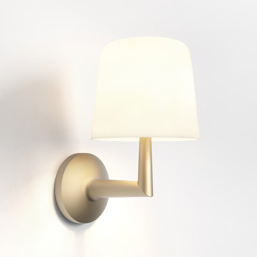 The light bronze Ella Wall Sconce from Astro lighting in a studio.