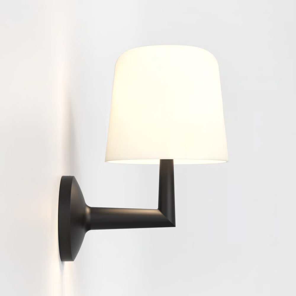 The matte black Ella Wall Sconce from Astro lighting from the side.