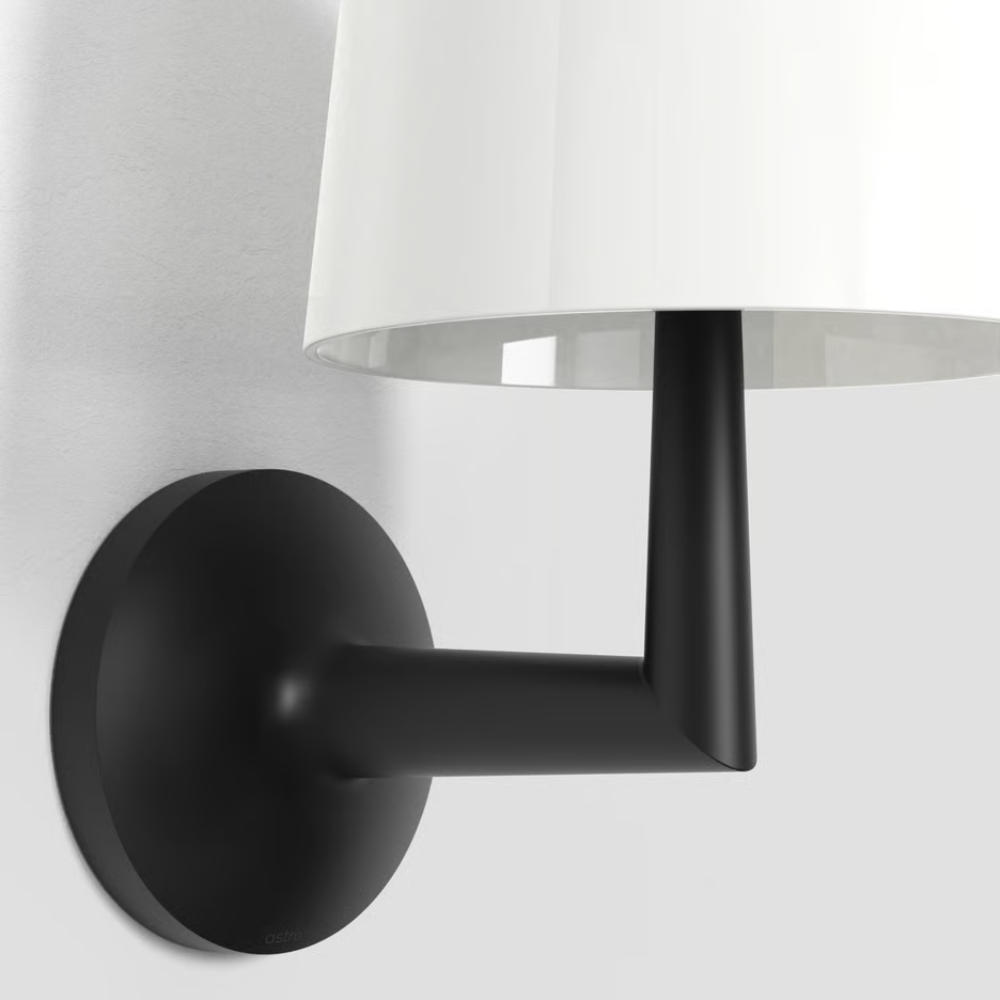 The matte black Ella Wall Sconce from Astro lighting turned off.
