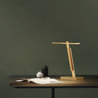 The Gerrit Desk Lamp from Astro Lighting on a desk.