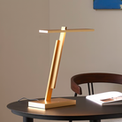 The Gerrit Desk Lamp from Astro Lighting in a workspace.