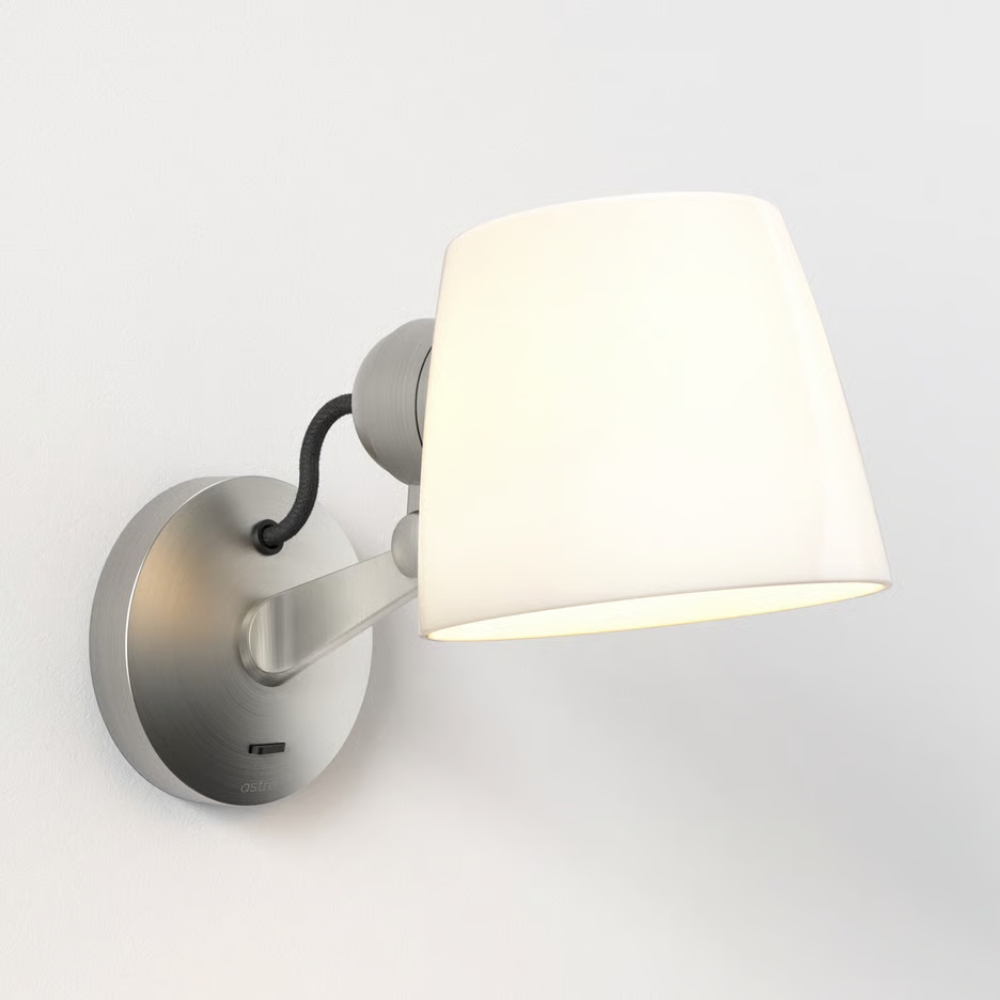 The matte nickel Imari Adjustable Wall Sconce from Astro Lighting in a studio.