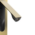 The matte gold Keta Reading Light from Astro Lighting close up.
