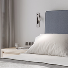 The matte nickel Keta Reading Light from Astro Lighting used as bedside lighting.