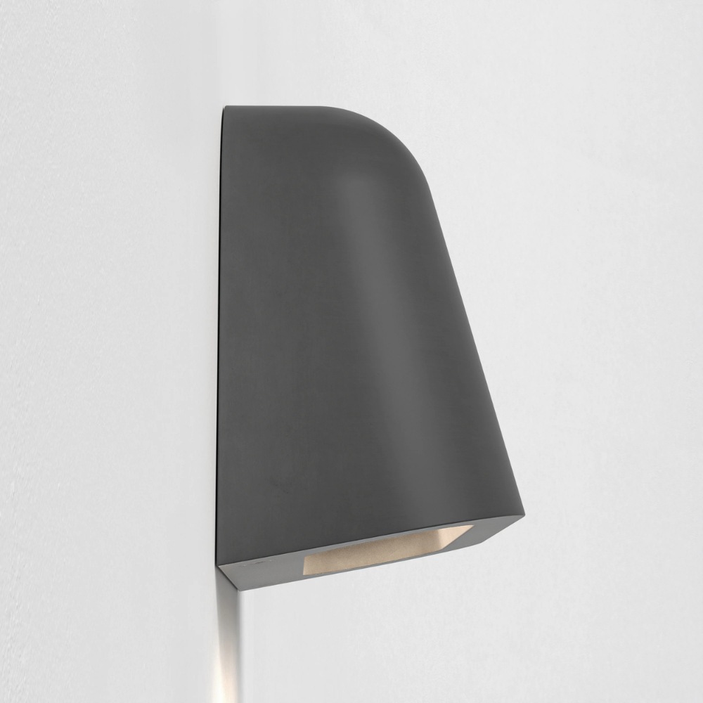 The Mast Twin Coastal Outdoor Wall Sconce by Astro Lighting in charcoal concrete from the profile.