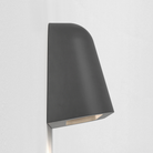 The Mast Twin Coastal Outdoor Wall Sconce by Astro Lighting in charcoal concrete from the profile.