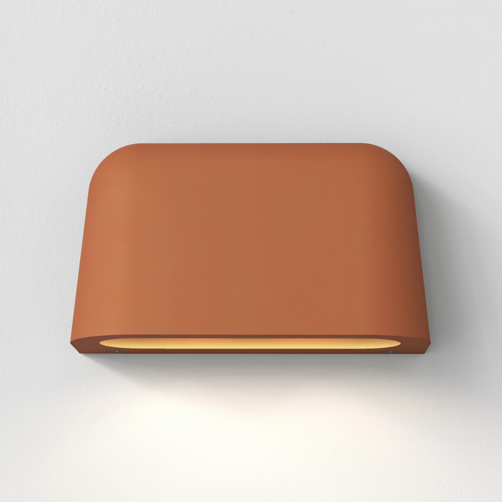 The Mast Twin Coastal Outdoor Wall Sconce by Astro Lighting in terracotta concrete from the front.