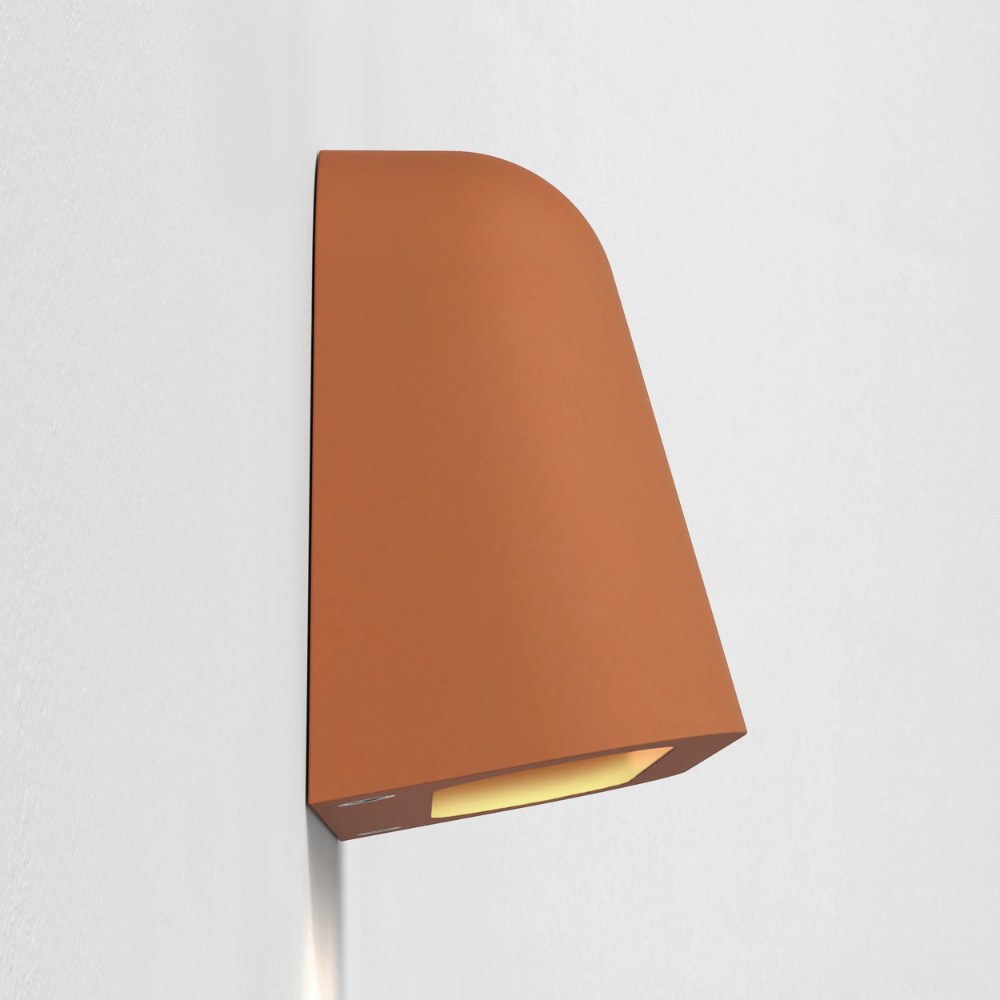 The Mast Twin Coastal Outdoor Wall Sconce by Astro Lighting in terracotta concrete profile view.