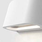 The light source of the Mast Twin Coastal Outdoor Wall Sconce by Astro Lighting in white concrete.
