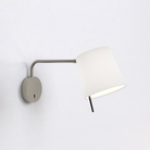 The matte nickel Mitsu Swing Arm Wall Sconce from Astro Lighting with the white shade in a guest bedroom.