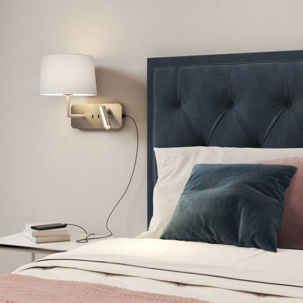 The bronze Side by Side USB Reading Light with the white fabric Round 250 Shade in a primary bedroom.