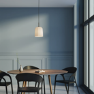 The medium Veo Pendant from Astro Lighting in a dining room.