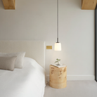 The small Veo Pendant from Astro Lighting in a guest bedroom.