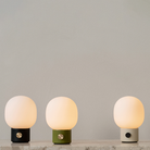 The JWDA Portable Table Lamp from Audo Copenhagen in a living room. all-groups