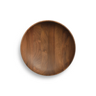 The Cusp Small Bowl from Blu Dot in walnut in a view from the top.