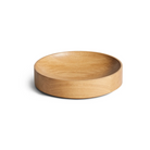 The Cusp Small Bowl from Blu Dot in white oak.