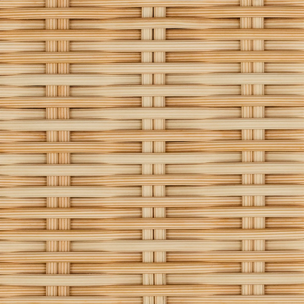The sunbrella stucco Loophole Outdoor Lounge Chair from Bludot with rattan detailing.