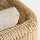 The sunbrella stucco Loophole Outdoor Lounge Chair from Bludot with a back view close up.
