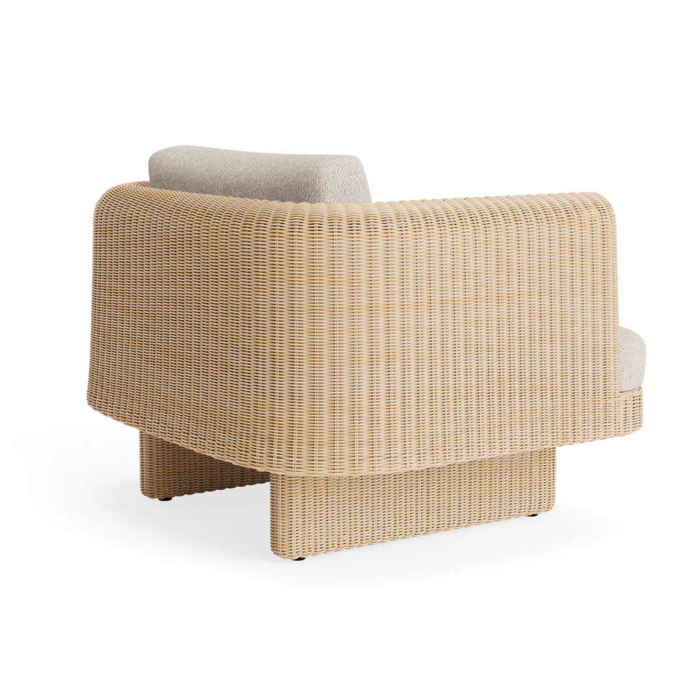 The sunbrella stucco Loophole Outdoor Lounge Chair from Bludot with a rear angle.