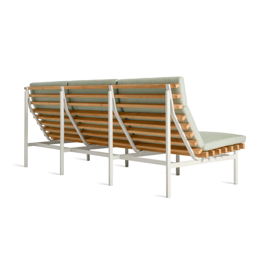 The sunbrella oasis Perch Outdoor 3 Seat Sofa with white frame by Bludot from the rear side.