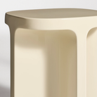 The ivory Small Talk Side Table from Bludot with edge close up.