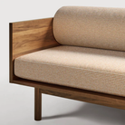 The Souvenir Sofa from Blu Dot with the irving copper stripe upholstery and walnut frame close up.