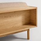 The Souvenir Sofa from Blu Dot with the irving copper stripe upholstery and white oak frame from the back in detail.