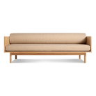 The Souvenir Sofa from Blu Dot with the irving copper stripe upholstery and white oak frame.