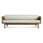 The Souvenir Sofa from Blu Dot with the irving gray blue stripe upholstery and walnut frame.