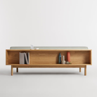 The Souvenir Sofa from Blu Dot with the irving gray blue stripe upholstery and white oak frame from the back.