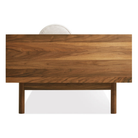 The Souvenir Sofa from Blu Dot with the landa stone upholstery and walnut frame from the side.