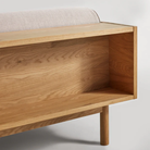 The Souvenir Sofa from Blu Dot with the landa stone upholstery and white oak frame showing the back in detail.