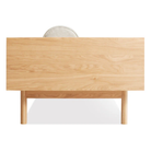 The Souvenir Sofa from Blu Dot with the landa stone upholstery and white oak frame from the side.