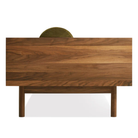 The Souvenir Sofa from Blu Dot with the loden green velvet upholstery and walnut frame from the side.