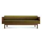 The Souvenir Sofa from Blu Dot with the loden green velvet upholstery and walnut frame.