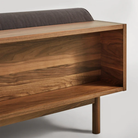 The Souvenir Sofa from Blu Dot with the storm velvet upholstery and walnut frame showing the back in detail.