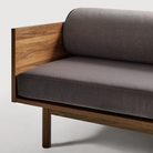 The Souvenir Sofa from Blu Dot with the storm velvet upholstery and walnut frame close up.