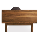 The Souvenir Sofa from Blu Dot with the storm velvet upholstery and walnut frame from the side.