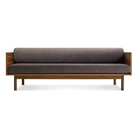 The Souvenir Sofa from Blu Dot with the storm velvet upholstery and walnut frame.