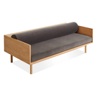 The Souvenir Sofa from Blu Dot with the storm velvet upholstery and white oak frame from a high angle.