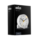 The white Round Alarm Clock BC01 from Braun with a box.