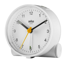 The white Round Alarm Clock BC01 by Braun from the side angle.