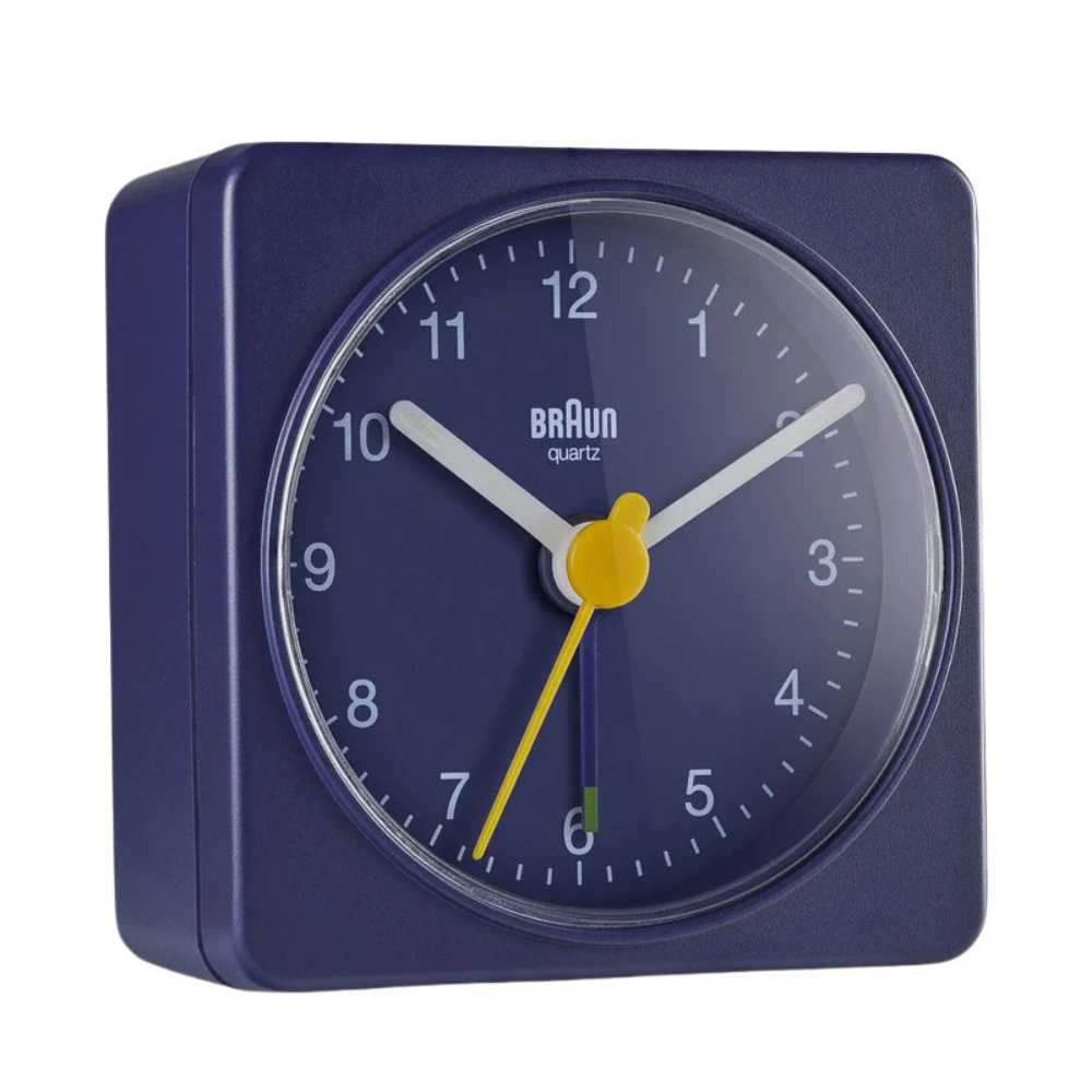 The blue BC02 Travel Alarm Clock by Braun from the side.