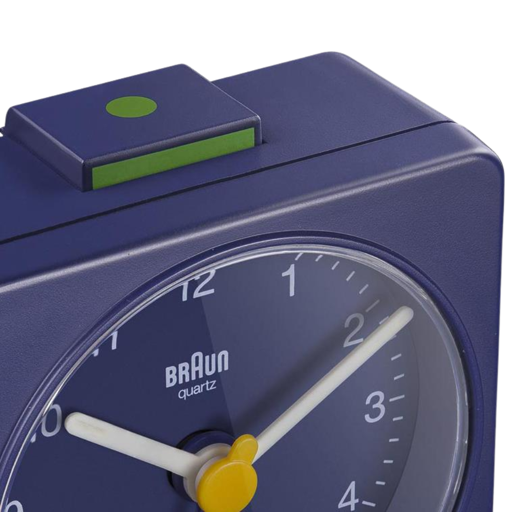 The blue BC02 Travel Alarm Clock by Braun from the top.