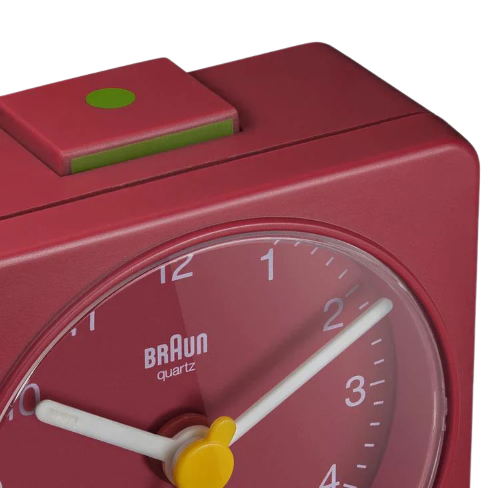 The red BC02 Travel Alarm Clock by Braun from the top.