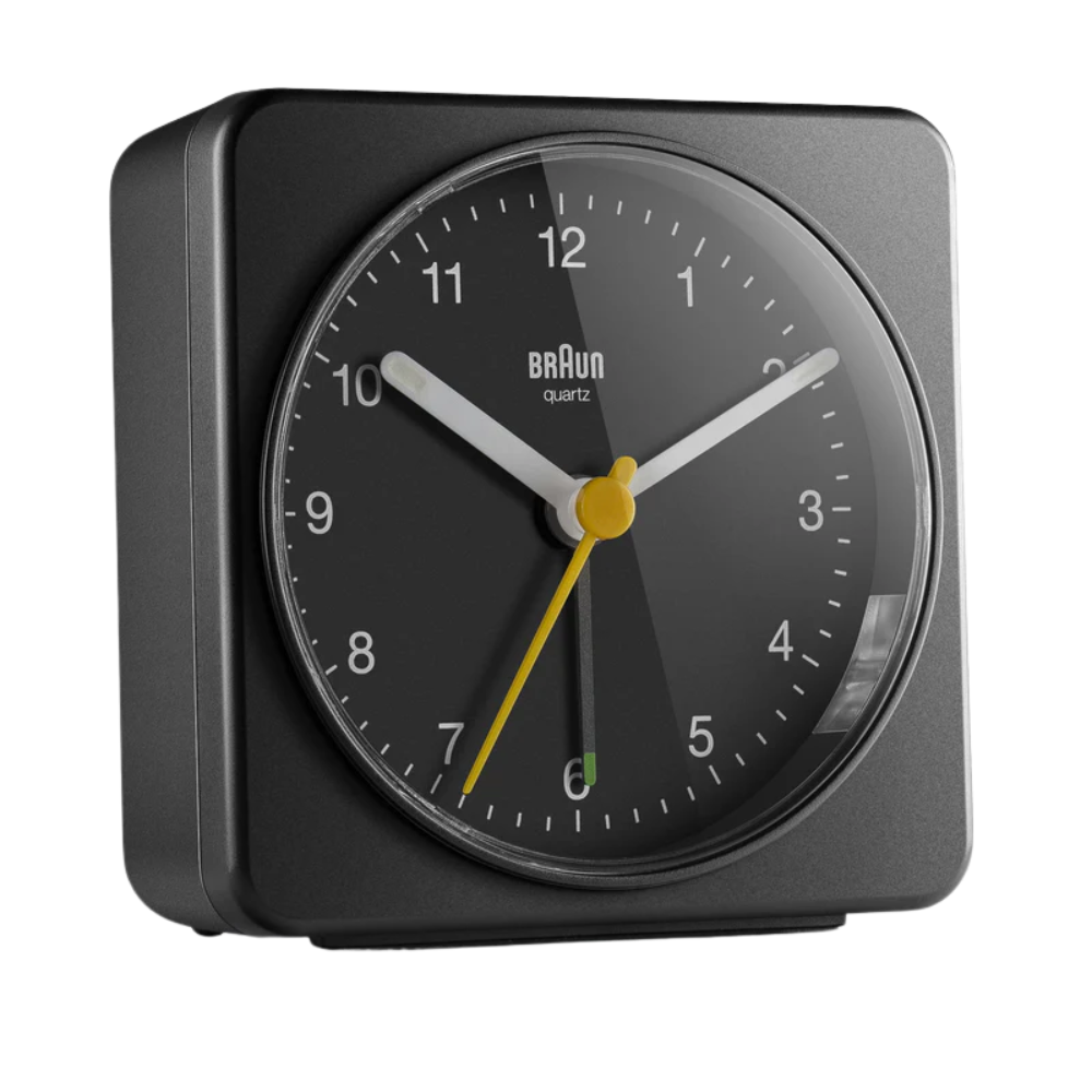 The black BC03 Large Travel Alarm Clock by Braun from the side.