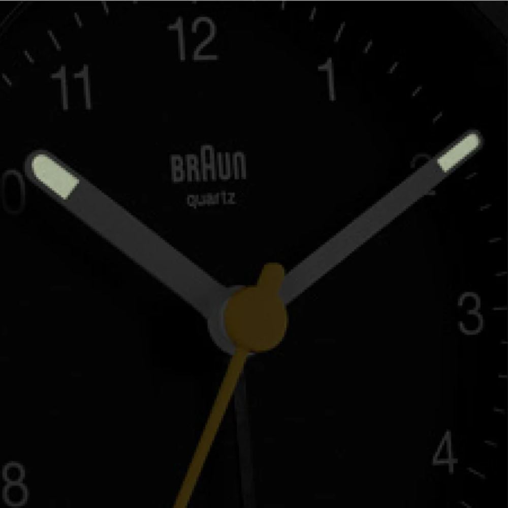 The BC12 Round Alarm Clock from Braun with a dial close-up. all-groups